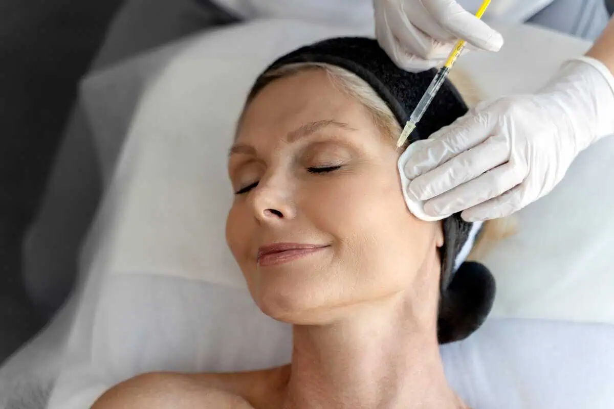 a woman receiving a Botox injection in Meridian, ID | Oasis MedSpa & IV Bar